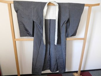 TJK zwart verticale streep